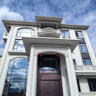 铜仁白麻别墅外墙干挂石材效果示例