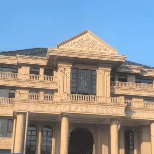 铜仁黄金麻别墅外墙干挂石材效果示例