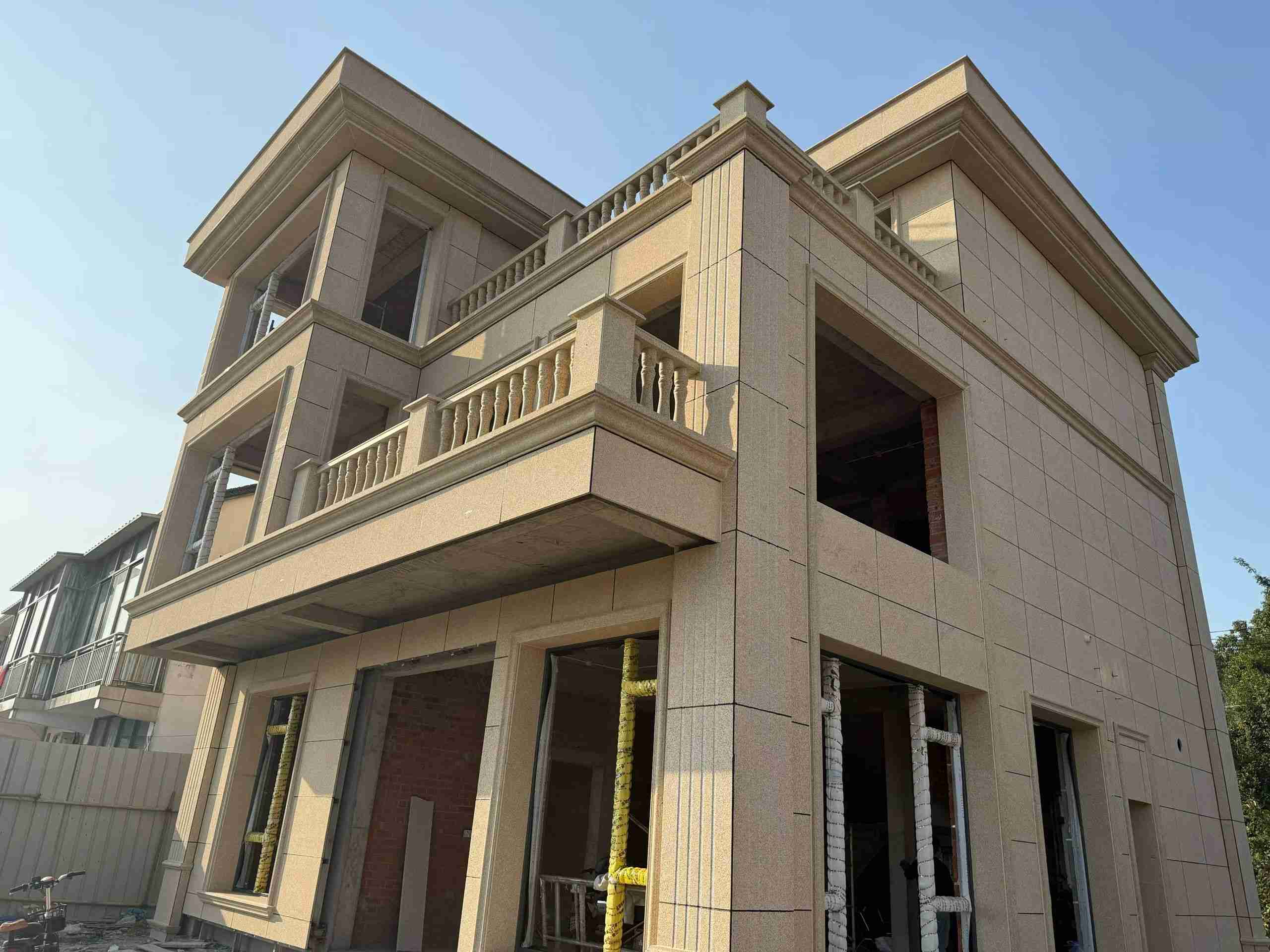 铜仁 黄金麻花岗岩石材荔枝面外墙干挂效果展示