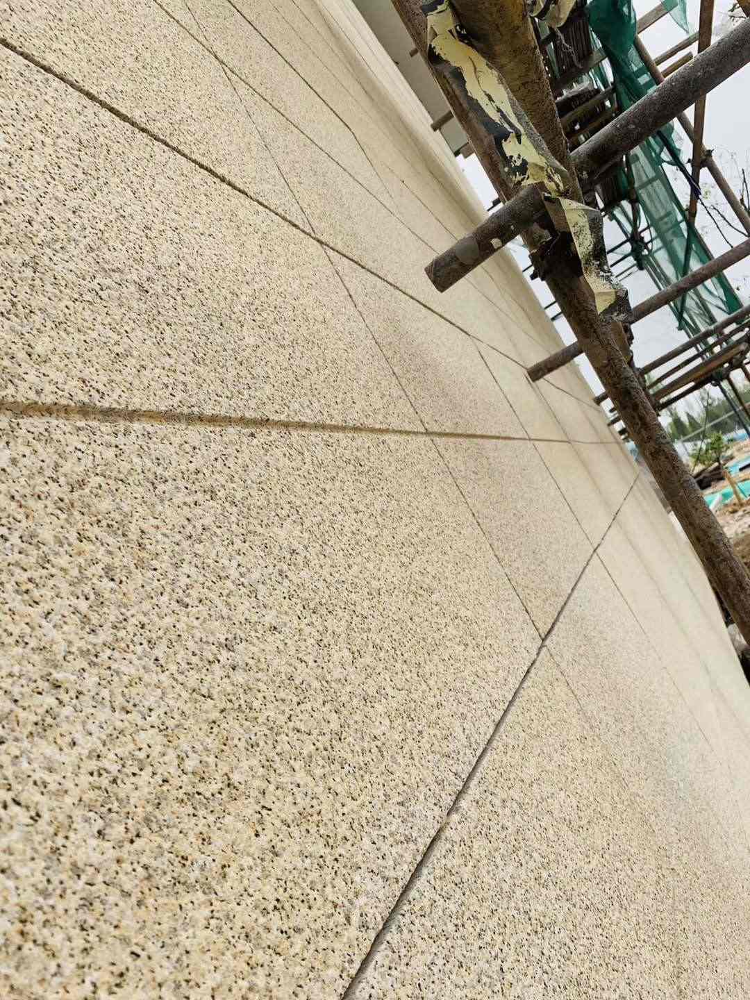 铜仁 黄金麻花岗岩荔枝面外墙干挂石材效果示例